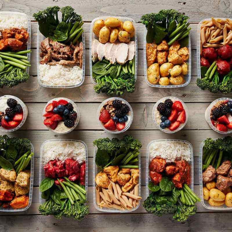 Macro Based Diet 3000 Calorie Weekly Meal Prep Plan featuring fresh, healthy meals including chicken, broccoli, potatoes, pasta, rice, and fresh berry overnight oats, tailored for high-calorie dietary needs.