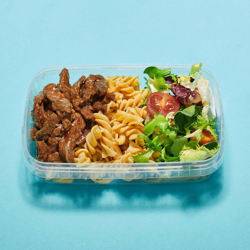 Tasty Sweet Chilli Steak with Pasta and Mixed Leaf Salad—healthy meal prep delivery for weight loss and muscle gain by Macro Based Diet.
